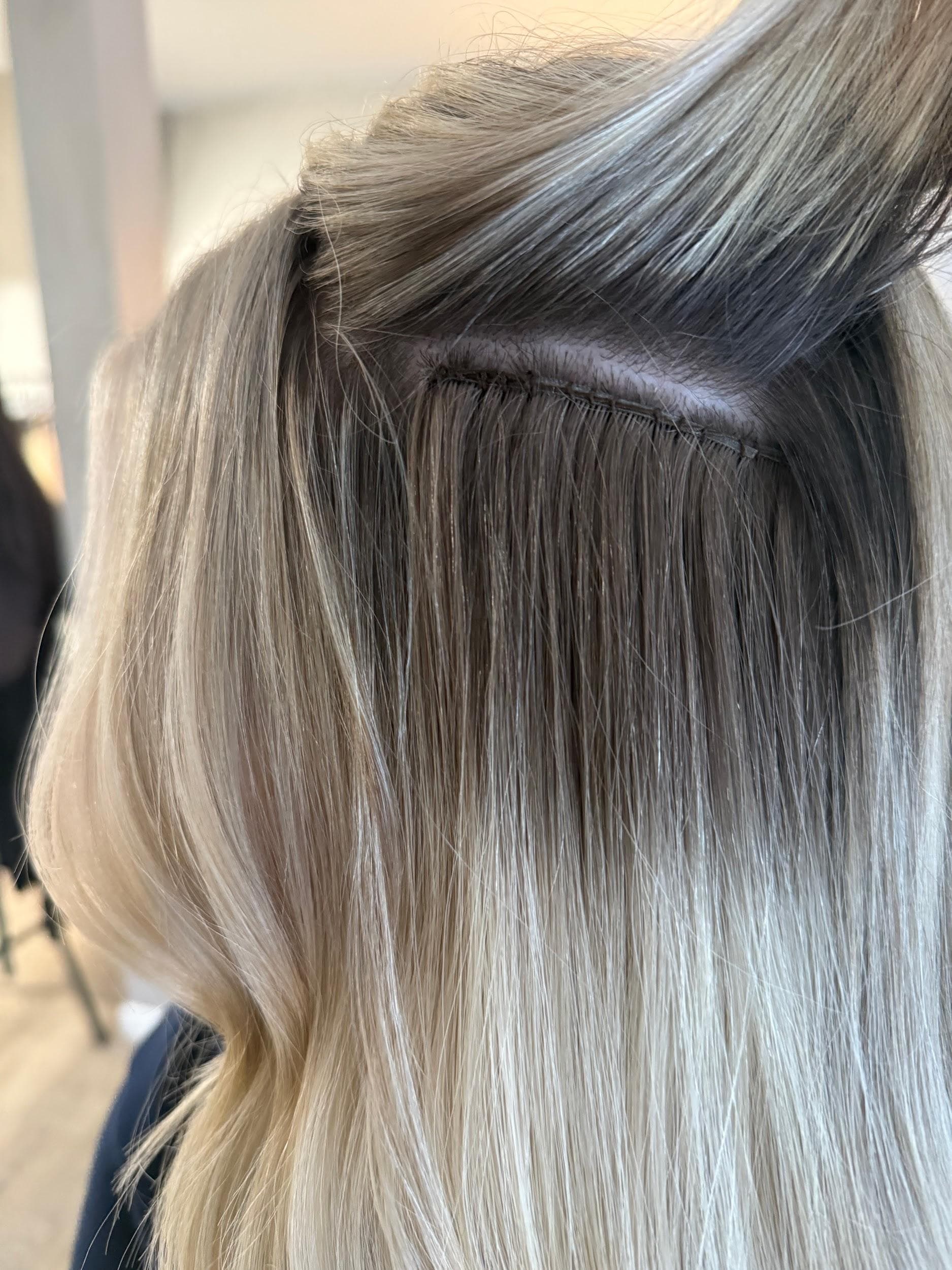 Invisible Bead Extensions detail — blonde hand-tied wefts